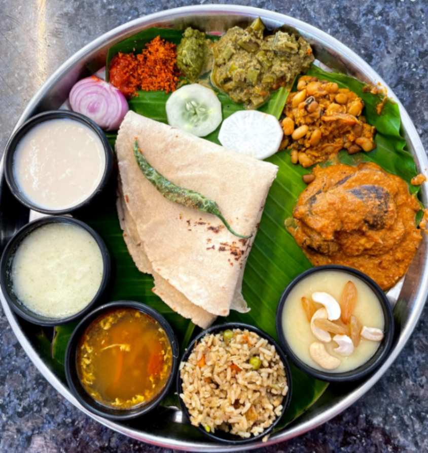 Delicious vegetarian meal at Hotel Heritage in Hassan – perfect for lunch and dinner.